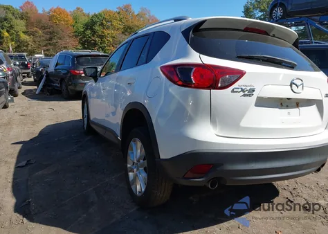 2015 Mazda Cx-5 Grand Touring z USA, uszkodzony, nr VIN JM3KE4DY0F0505909